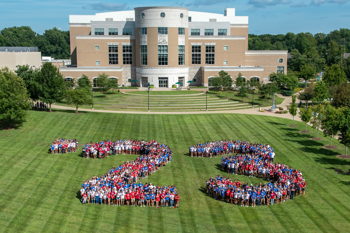 The USI Class of 2023 poses for the annual class photo on the Quad