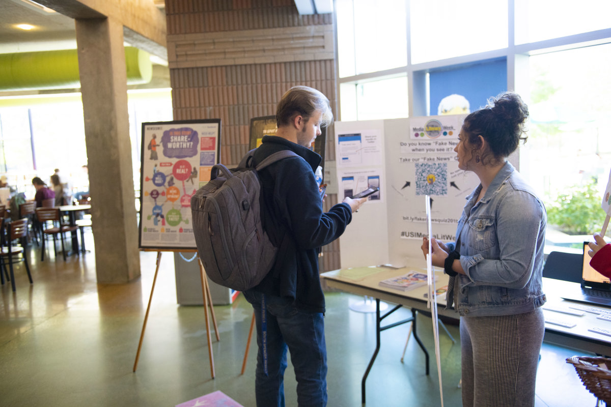 USI students participating in a Fake News quiz and receiving information on media literacy as part of National Media Literacy Week.
