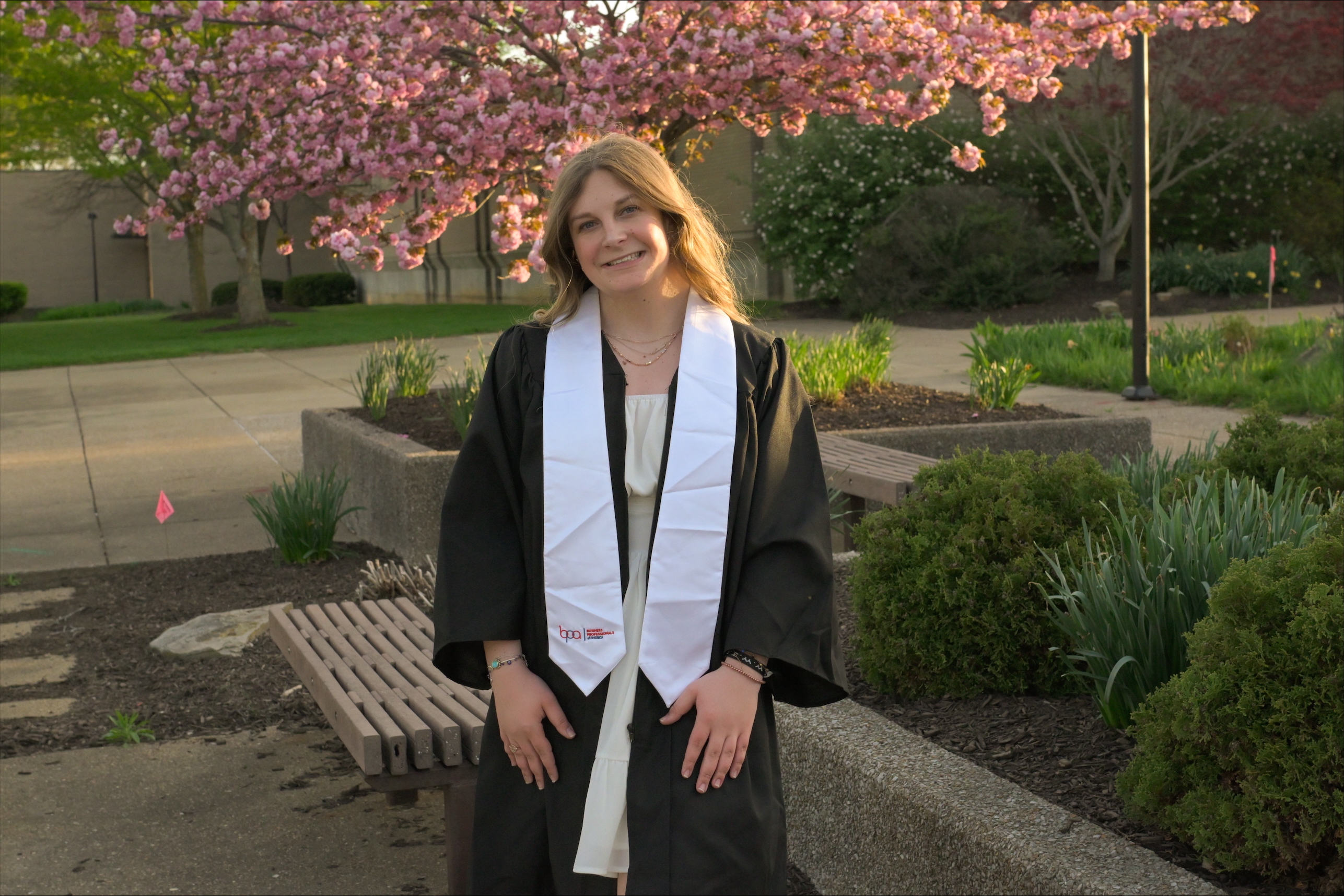 Sydney in graduation gown