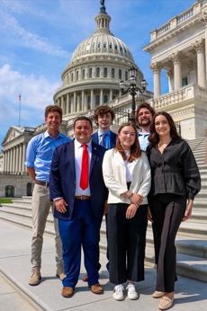 Tommy with fellow interns in front of the U.S. Capitol