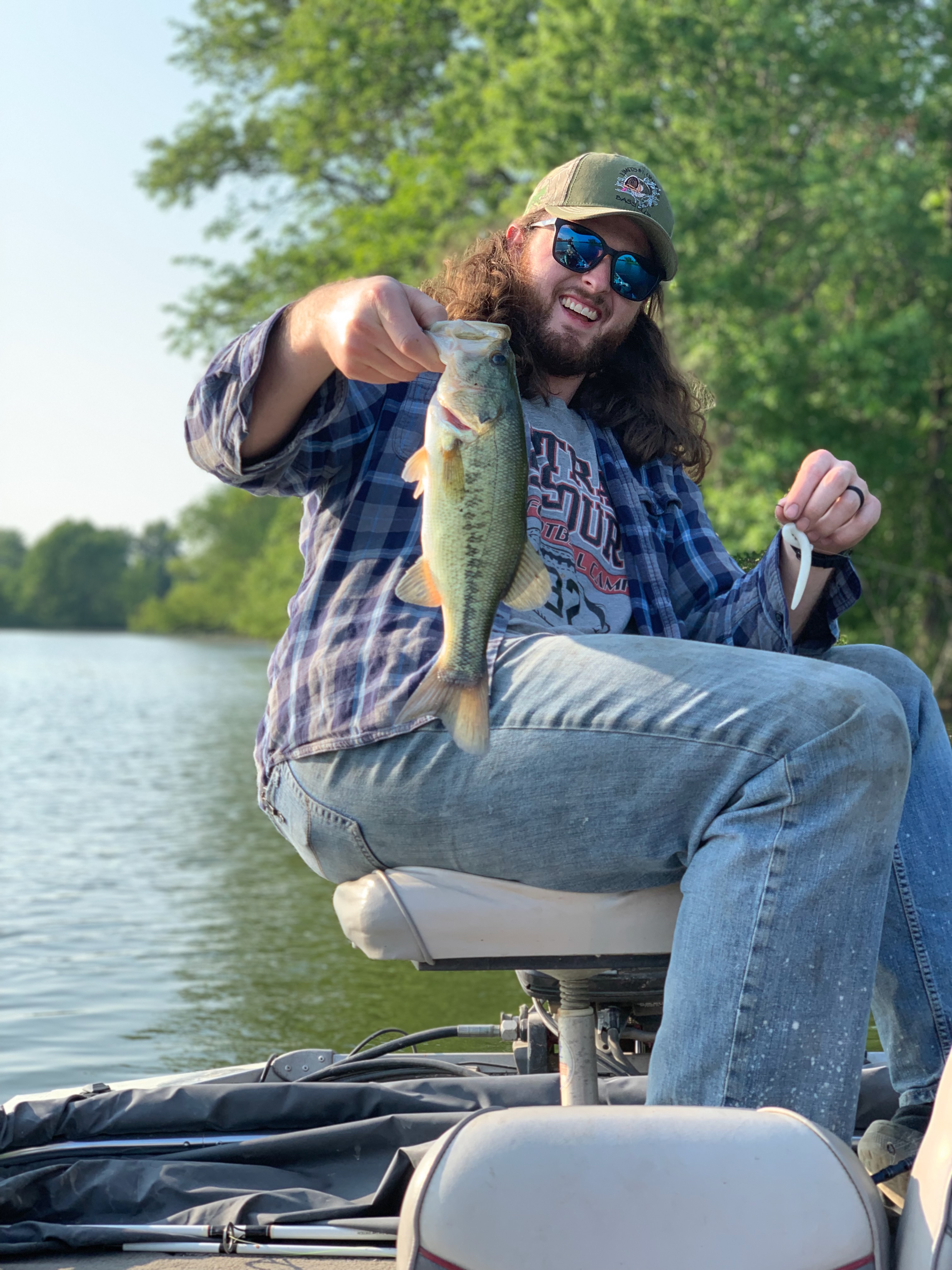 Ezra holding a fish he caught