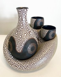 4 piece serving set: Two Cups, One server, Base Stoneware, underglaze, satin black and reticulating glazes 12” x 10” x 9”