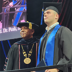 Dalton Mills and USI President at Graduation